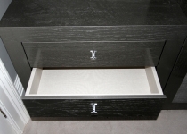 Dark bespoke wardrobe's storage space