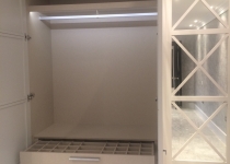 Mirrored bespoke wardrobe inside