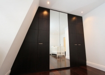 stained oak veneer wardrobe with mirrored doors